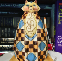 painted and carved cat